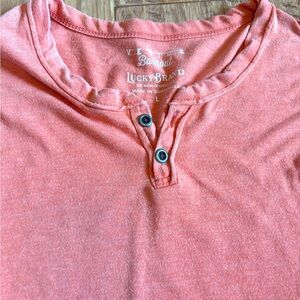Lucky orange/coral burnout tee. Great condition!